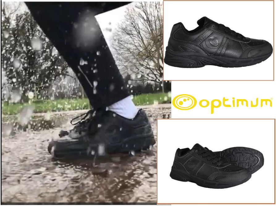 a girl jumping in the puddle wearing optimum school trainers